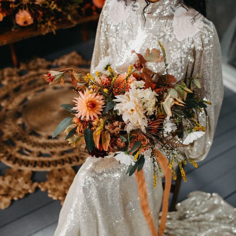 Autumnal wedding bouquet ties with ribbon