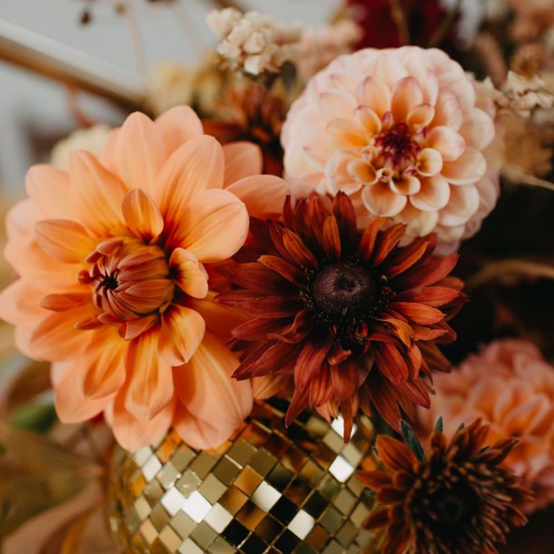 gold glitter ball and dahlias