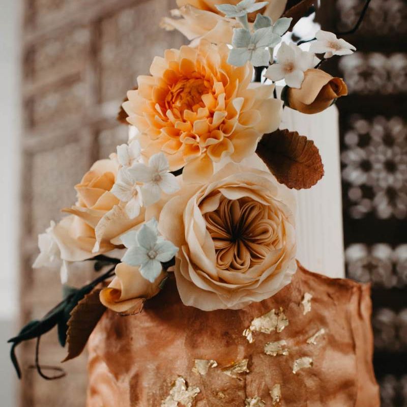 Wedding cake with gold leaf decor