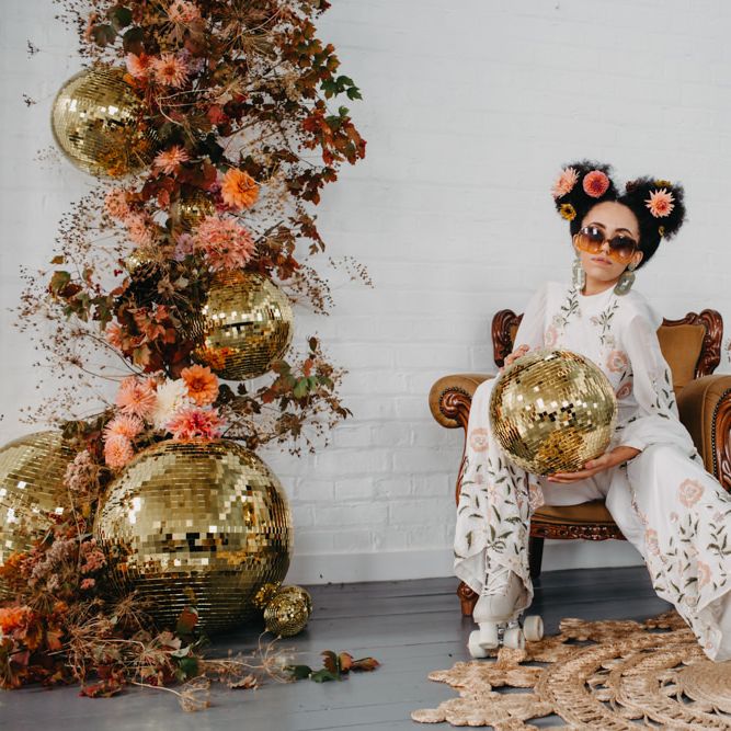 70s disco wedding them with bride in jumpsuit and roller skates