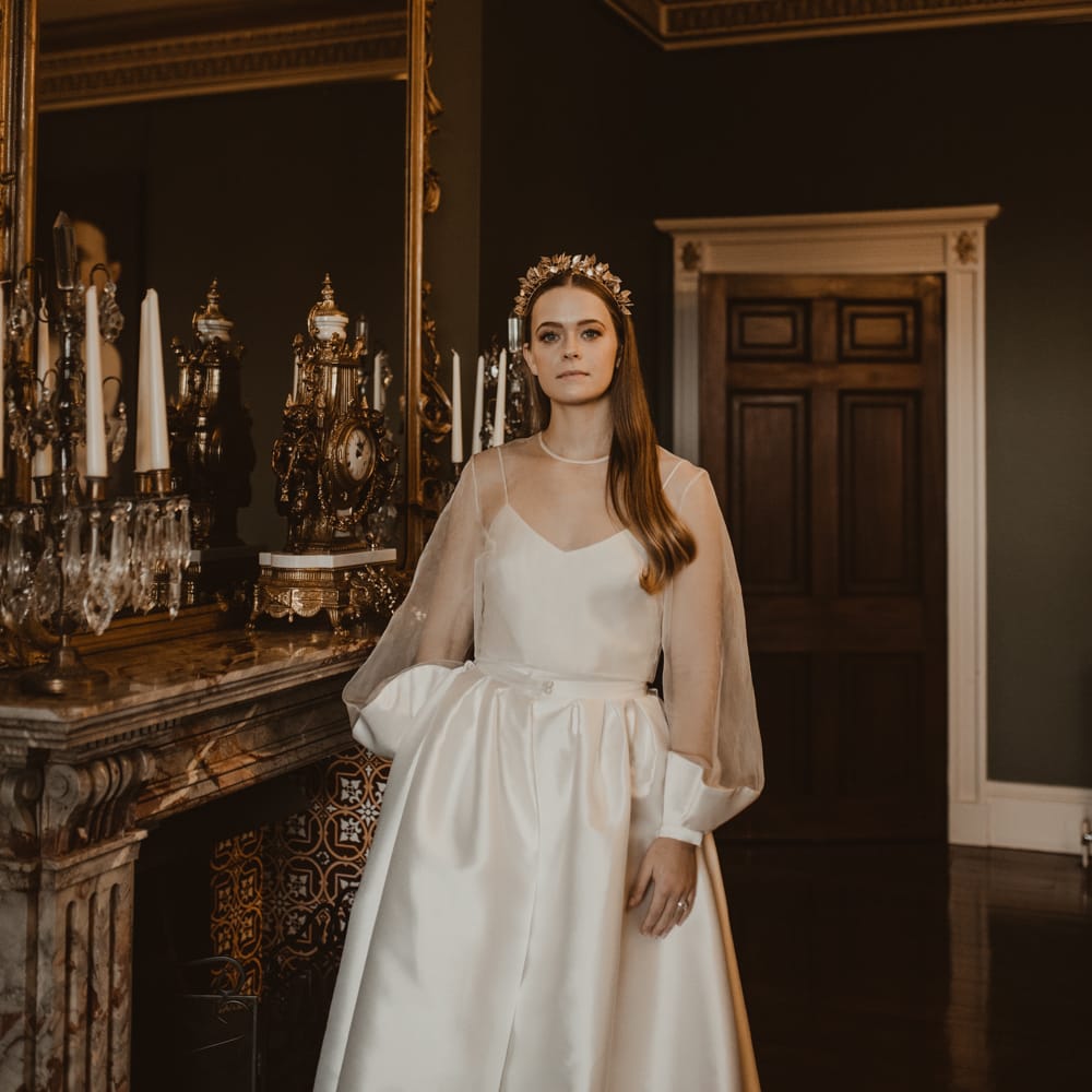 Beautiful Bride in Sheer Front &amp; Long Sleeved Wedding Dress with Gold Hair Band | Romantic Pink and Gold Wedding Inspiration in a Modern Summer House at Garthmyl Hall by KnockKnockPenny Studio | Nesta Lloyd Photography