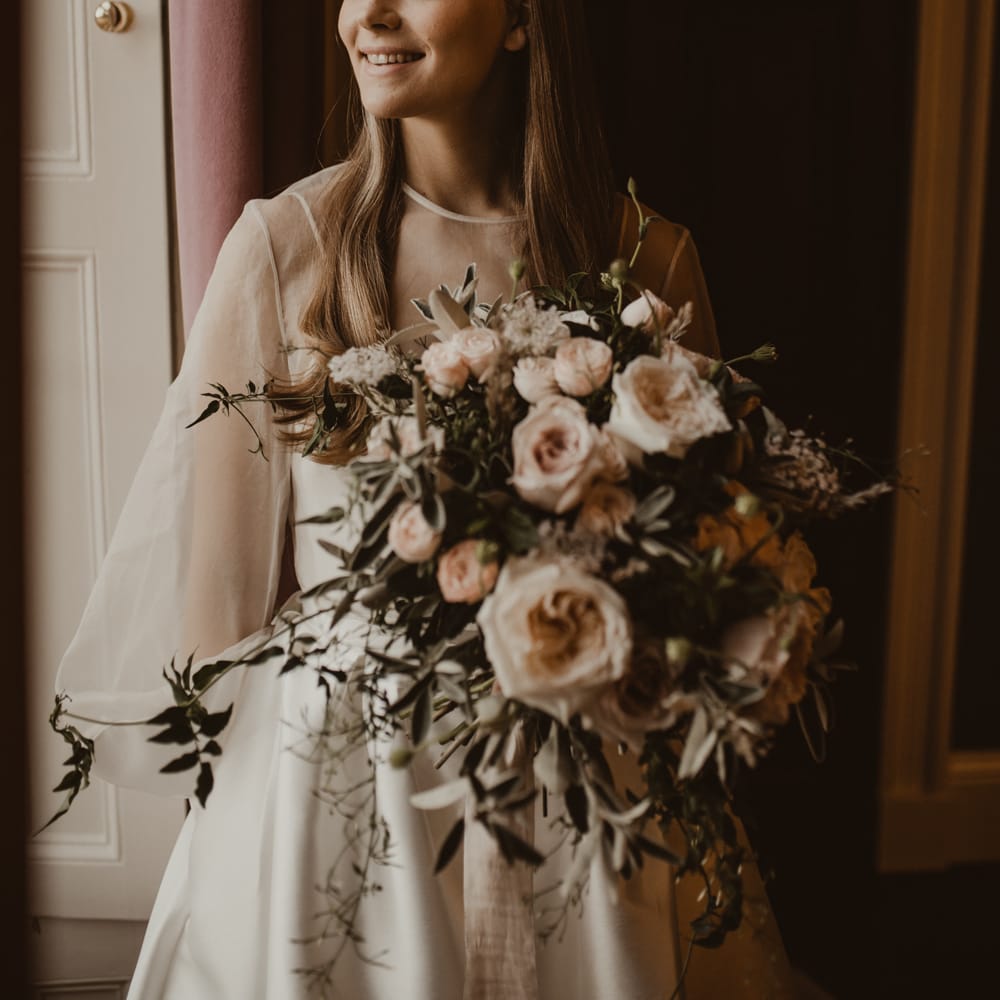 Beautiful Bride in Sheer Front &amp; Long Sleeved Wedding Dress with Gold Hair Band | Romantic Pink and Gold Wedding Inspiration in a Modern Summer House at Garthmyl Hall by KnockKnockPenny Studio | Nesta Lloyd Photography