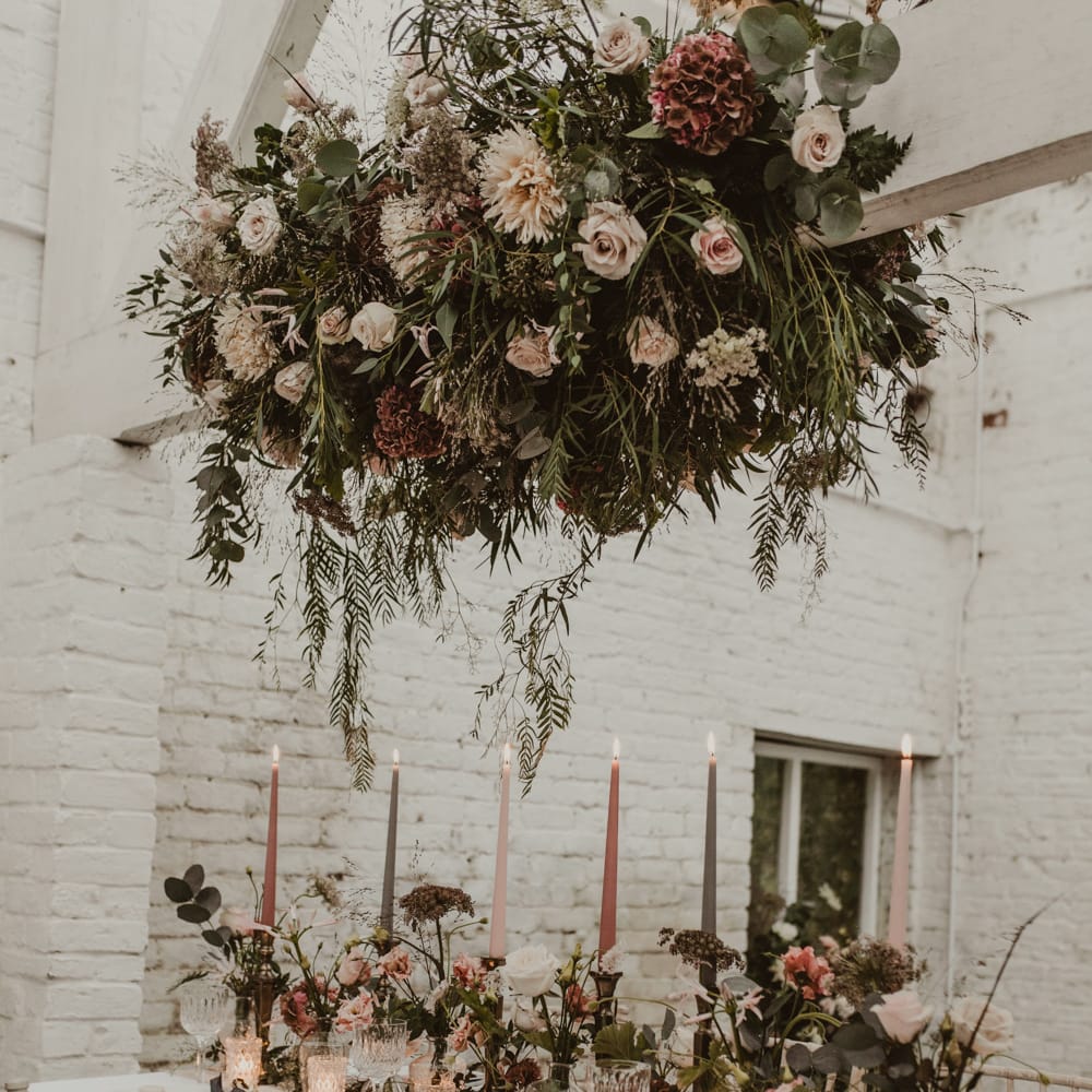 Hanging Floral Installation &amp; Tablescape with Floral Centrepieces &amp; Taper Candles | Romantic Pink and Gold Wedding Inspiration in a Modern Summer House at Garthmyl Hall by KnockKnockPenny Studio | Nesta Lloyd Photography