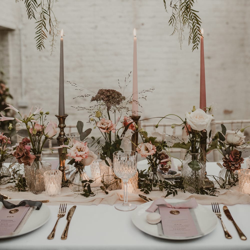 Hanging Floral Installation &amp; Tablescape with Floral Centrepieces &amp; Taper Candles | Romantic Pink and Gold Wedding Inspiration in a Modern Summer House at Garthmyl Hall by KnockKnockPenny Studio | Nesta Lloyd Photography