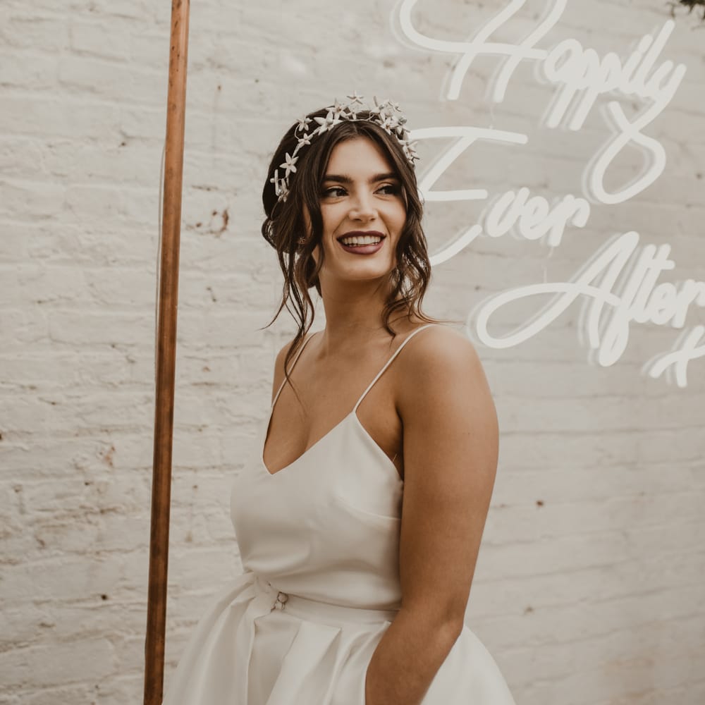 Hanging Neon Happily Ever After Sign on Cooper Frame Wedding Decor | Beautiful Bride in Spaghetti Strap Dress &amp; Star Headdress |  Romantic Pink and Gold Wedding Inspiration in a Modern Summer House at Garthmyl Hall by KnockKnockPenny Studio | Nesta Lloyd Photography