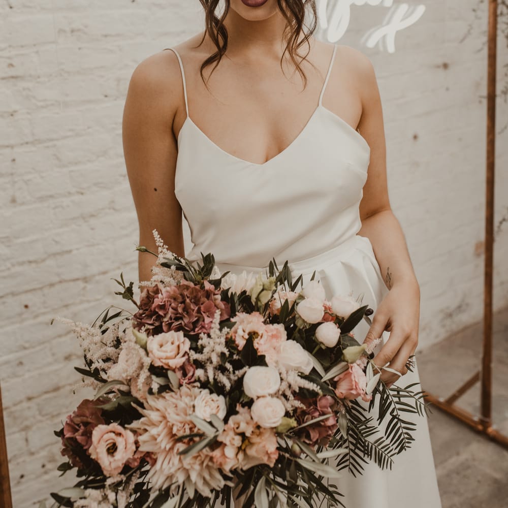 Hanging Neon Happily Ever After Sign on Cooper Frame Wedding Decor | Beautiful Bride in Spaghetti Strap Dress &amp; Star Headdress | Romantic Pink and Gold Wedding Inspiration in a Modern Summer House at Garthmyl Hall by KnockKnockPenny Studio | Nesta Lloyd Photography