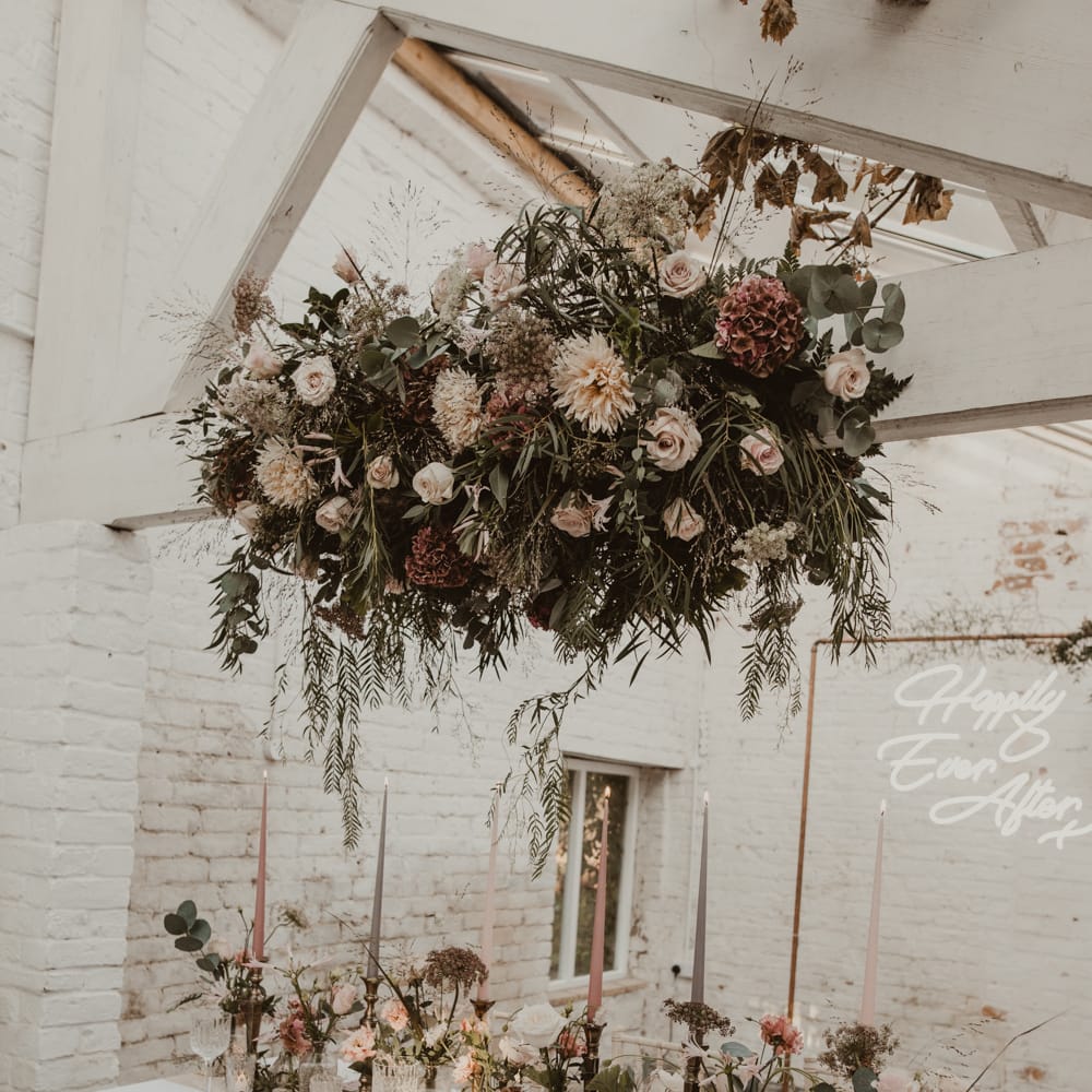 Hanging Floral Installation &amp; Tablescape with Floral Centrepieces &amp; Taper Candles | Romantic Pink and Gold Wedding Inspiration in a Modern Summer House at Garthmyl Hall by KnockKnockPenny Studio | Nesta Lloyd Photography