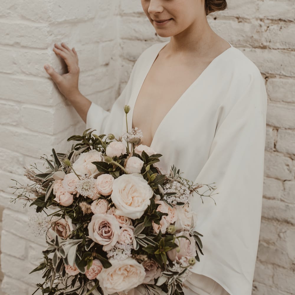 Beautiful Bride in Wrap Wedding Dress &amp; Vine Headpiece | Romantic Pink and Gold Wedding Inspiration in a Modern Summer House at Garthmyl Hall by KnockKnockPenny Studio | Nesta Lloyd Photography