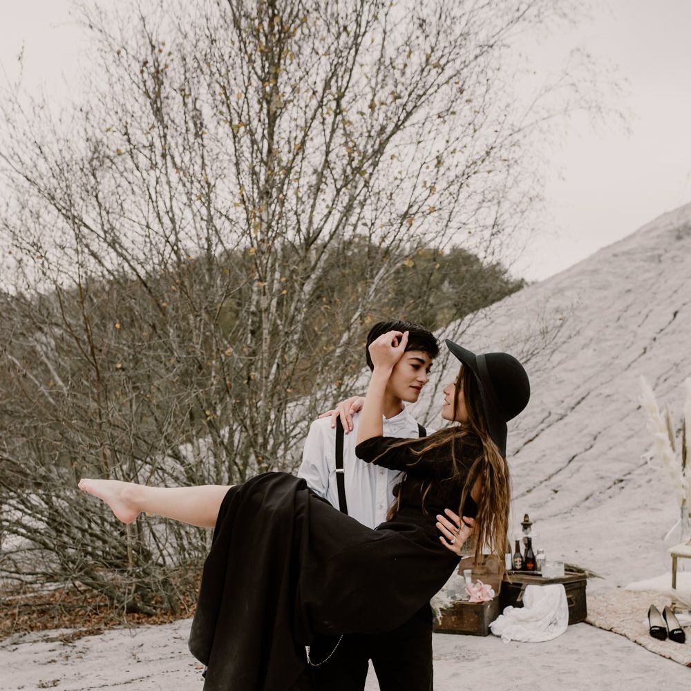 Bride in Portez Vos Idées Black Wedding Dress | Bride in Black Trousers, White Shirt &amp; Braces | Wild Same Sex Couple Wedding Inspiration Shoot | Anne Letournel Photography