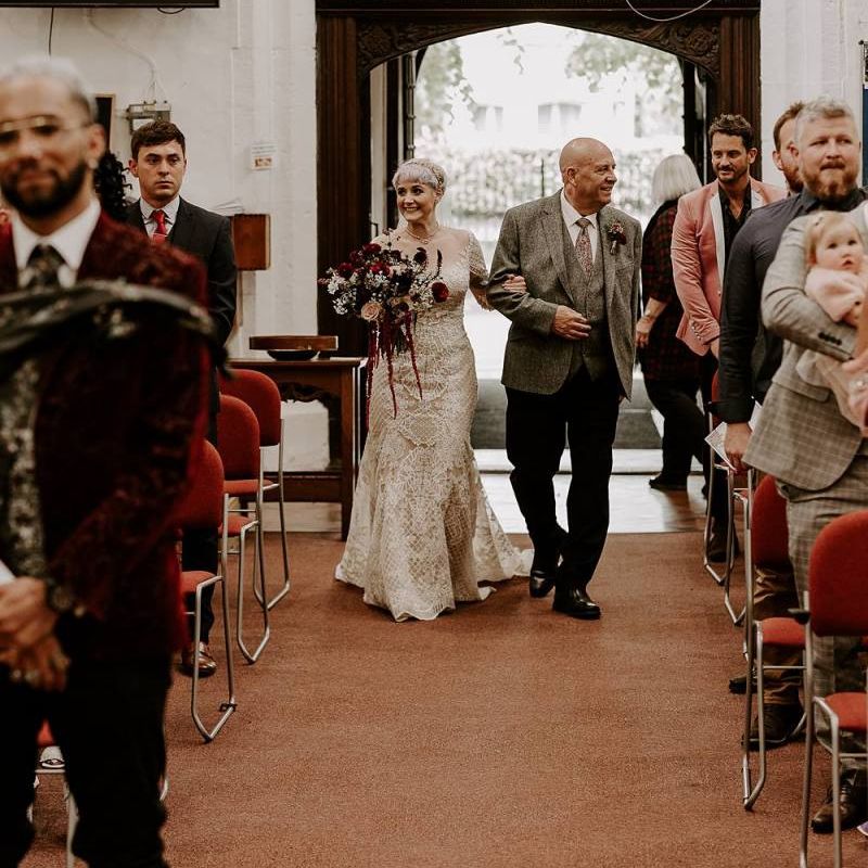 Church wedding ceremony bridal entrance in Lillian West wedding dress