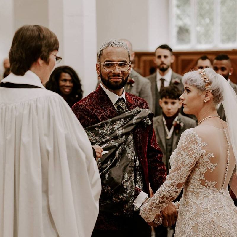 Bride and groom exchanging vows at church wedding ceremony