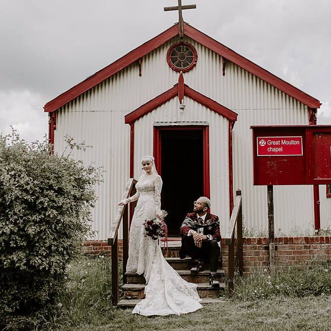 Bride in Lillian West wedding dress and groom in blazer