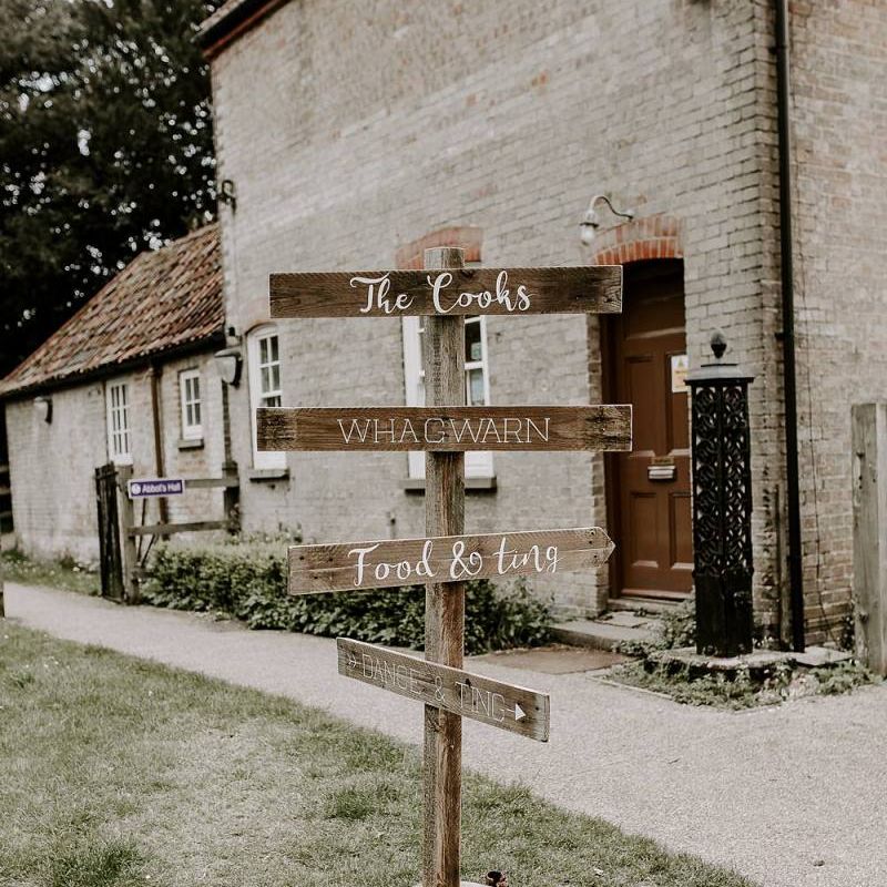 wedding direction sign post