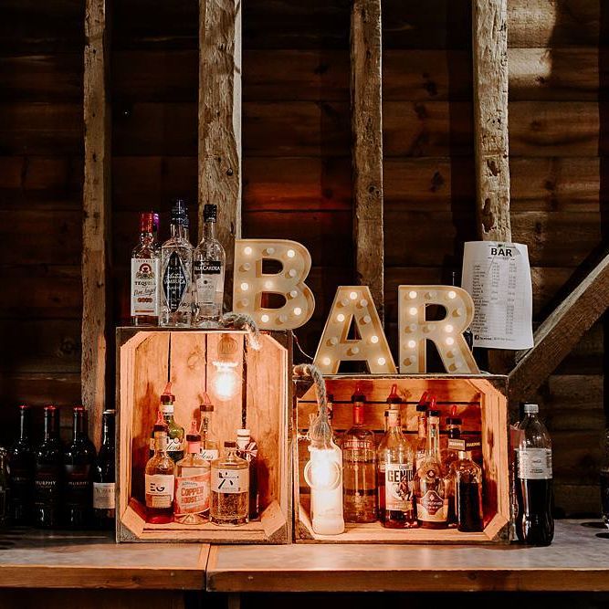 Bar with wooden crates and light up letters