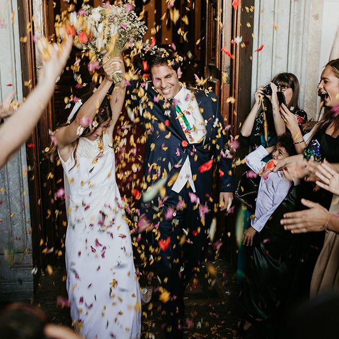 Confetti Exit | Bride in Simple &amp; Elegant Teresa Helbig Wedding Dress  | Groom in Traditional Tails | Authentic Spanish Wedding at Masia Ribas, Barcelona | Sara Lobla Photography