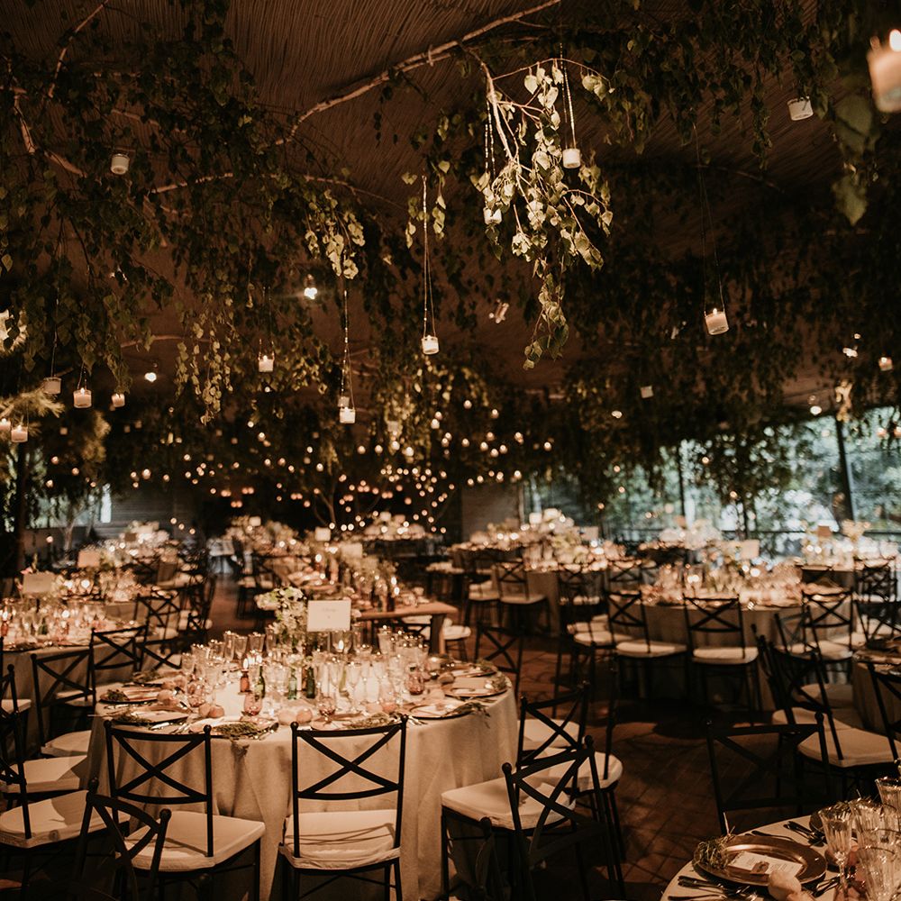 Foliage &amp; Fairy Light Wedding Reception Decor | Authentic Spanish Wedding at Masia Ribas, Barcelona | Sara Lobla Photography