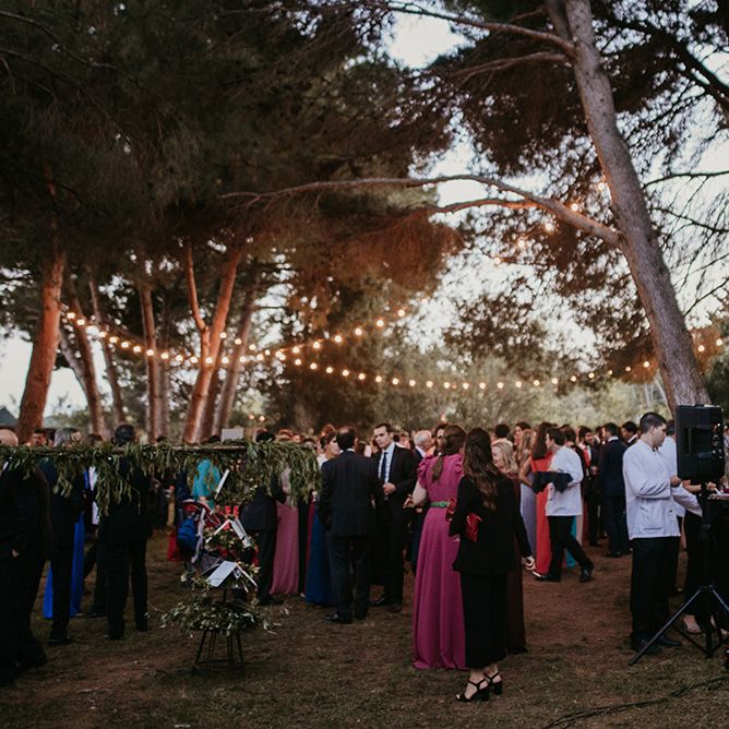 Outdoor Reception with Festoon Lights | Authentic Spanish Wedding at Masia Ribas, Barcelona | Sara Lobla Photography