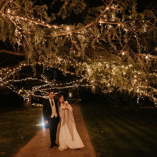 Festoon Lights | Bride in Simple &amp; Elegant Teresa Helbig Wedding Dress  | Groom in Traditional Tails | Authentic Spanish Wedding at Masia Ribas, Barcelona | Sara Lobla Photography