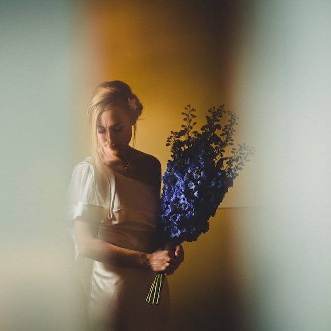 Flowers by Stiatti Fiori. Intimate Prosecco Pool Party Wedding in Tuscany. Bride wears Livio Lacurre Gown, Groom wears Beggars Run Custom Suit. Photography by Livio Lacurre.