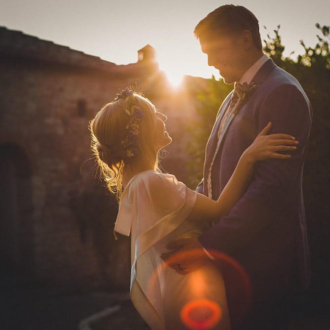 Intimate Prosecco Pool Party Wedding in Tuscany. Bride wears Livio Lacurre Gown, Groom wears Beggars Run Custom Suit. Photography by Livio Lacurre.