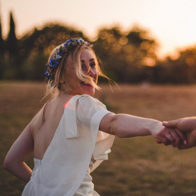 Intimate Prosecco Pool Party Wedding in Tuscany. Bride wears Livio Lacurre Gown, Groom wears Beggars Run Custom Suit. Photography by Livio Lacurre.