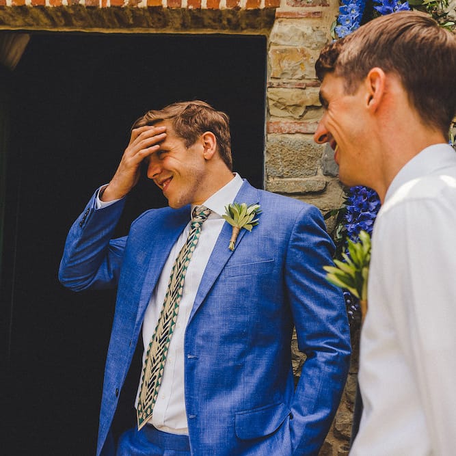 Intimate Prosecco Pool Party Wedding in Tuscany. Bride wears Livio Lacurre Gown, Groom wears Beggars Run Custom Suit. Photography by Livio Lacurre.