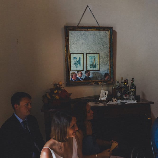 Intimate Prosecco Pool Party Wedding in Tuscany. Bride wears Livio Lacurre Gown, Groom wears Beggars Run Custom Suit. Photography by Livio Lacurre.