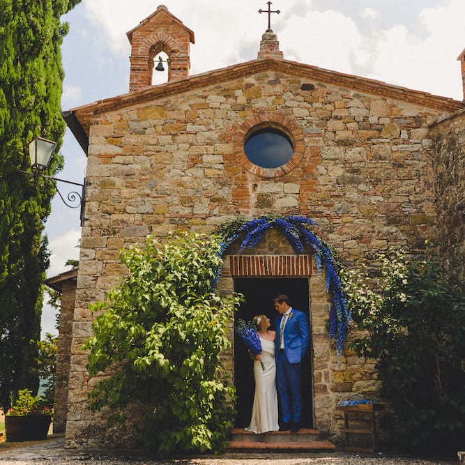 Flowers by Stiatti Fiori. Intimate Prosecco Pool Party Wedding in Tuscany. Bride wears Livio Lacurre Gown, Groom wears Beggars Run Custom Suit. Photography by Livio Lacurre.
