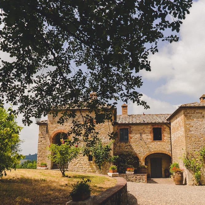 La Pieve Marsina. Intimate Prosecco Pool Party Wedding in Tuscany. Bride wears Livio Lacurre Gown, Groom wears Beggars Run Custom Suit. Photography by Livio Lacurre.
