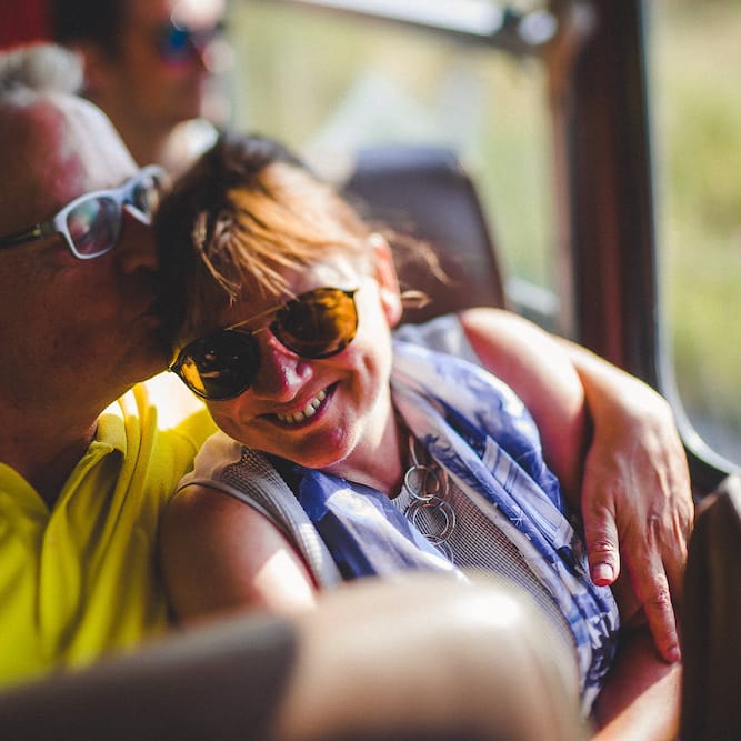 Vintage Bus Wedding Transport from Drive in Style. Intimate Prosecco Pool Party Wedding in Tuscany. Bride wears Livio Lacurre Gown, Groom wears Beggars Run Custom Suit. Photography by Livio Lacurre.