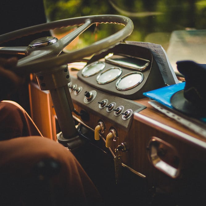 Vintage Bus Wedding Transport from Drive in Style. Intimate Prosecco Pool Party Wedding in Tuscany. Bride wears Livio Lacurre Gown, Groom wears Beggars Run Custom Suit. Photography by Livio Lacurre.