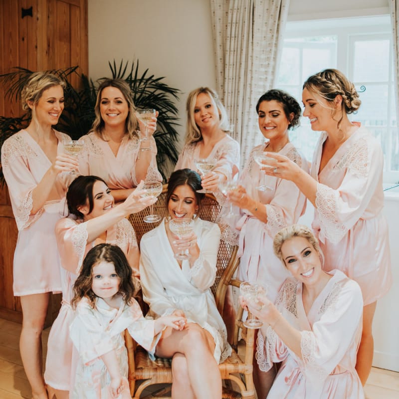 Pink getting ready robes for Bury Court Barn wedding