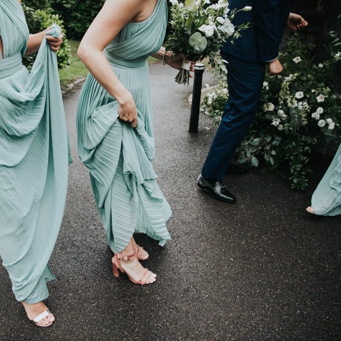 Green bridesmaid dresses for country wedding at Bury Court Barn