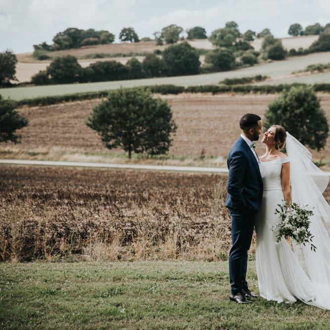 Bride and groom at Bury Court Barn wedding