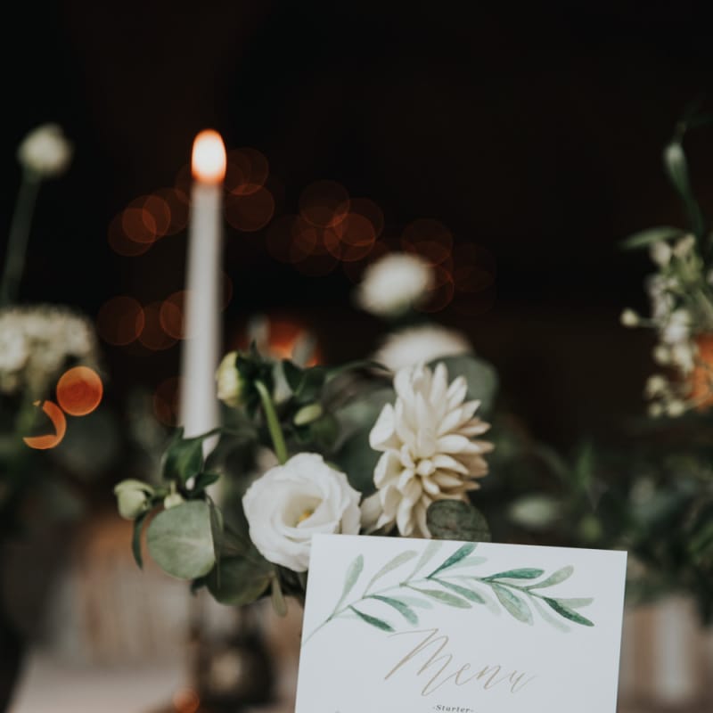 Foliage decorated wedding stationery