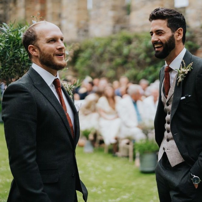 Groom waiting at the aisle of Newburgh Priory for outdoor ceremony with Italian twist