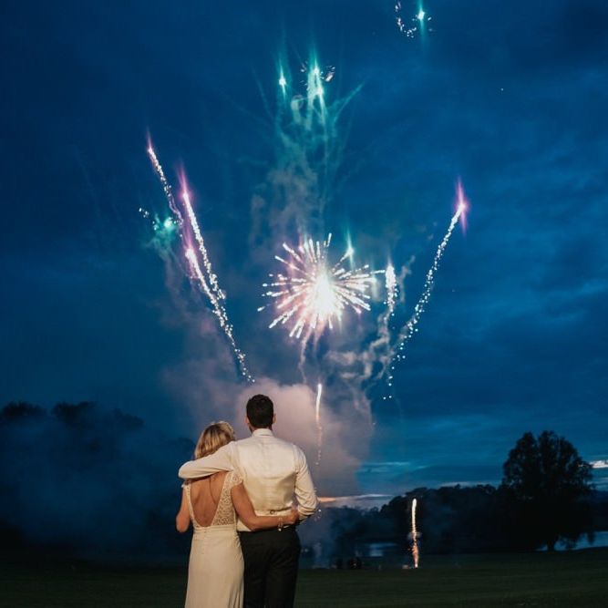 Bride and groom enjoy the fireworks at Newburgh Priory wedding