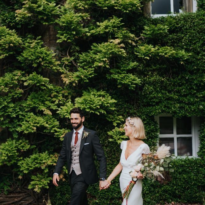 Bride and groom at Newburgh Priory outdoor wedding in Spring