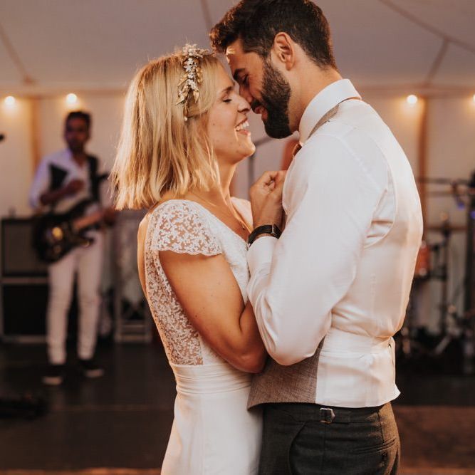 First dance and marquee reception with fairy lights