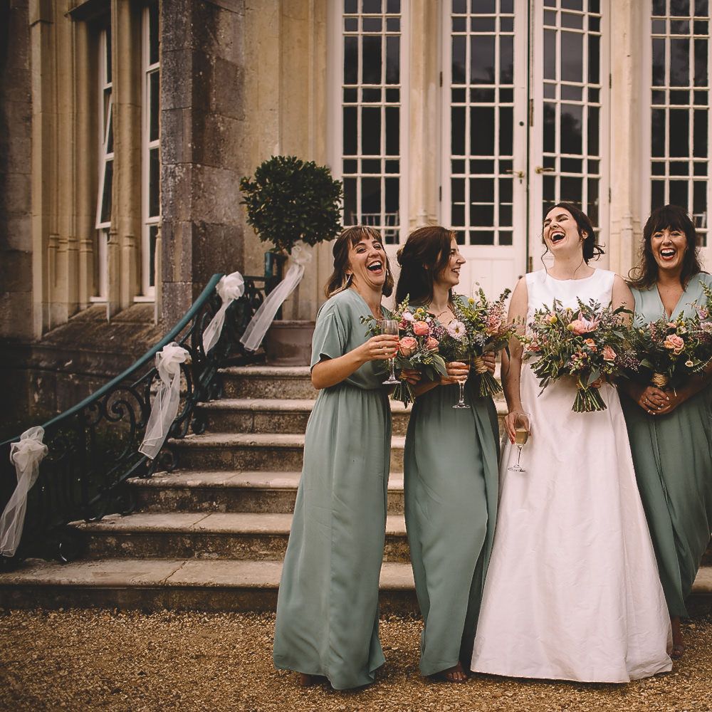 Bride in Homemade Wedding Dress and Bridesmaids in  Green Wrap Dresses from &amp; Other Stories