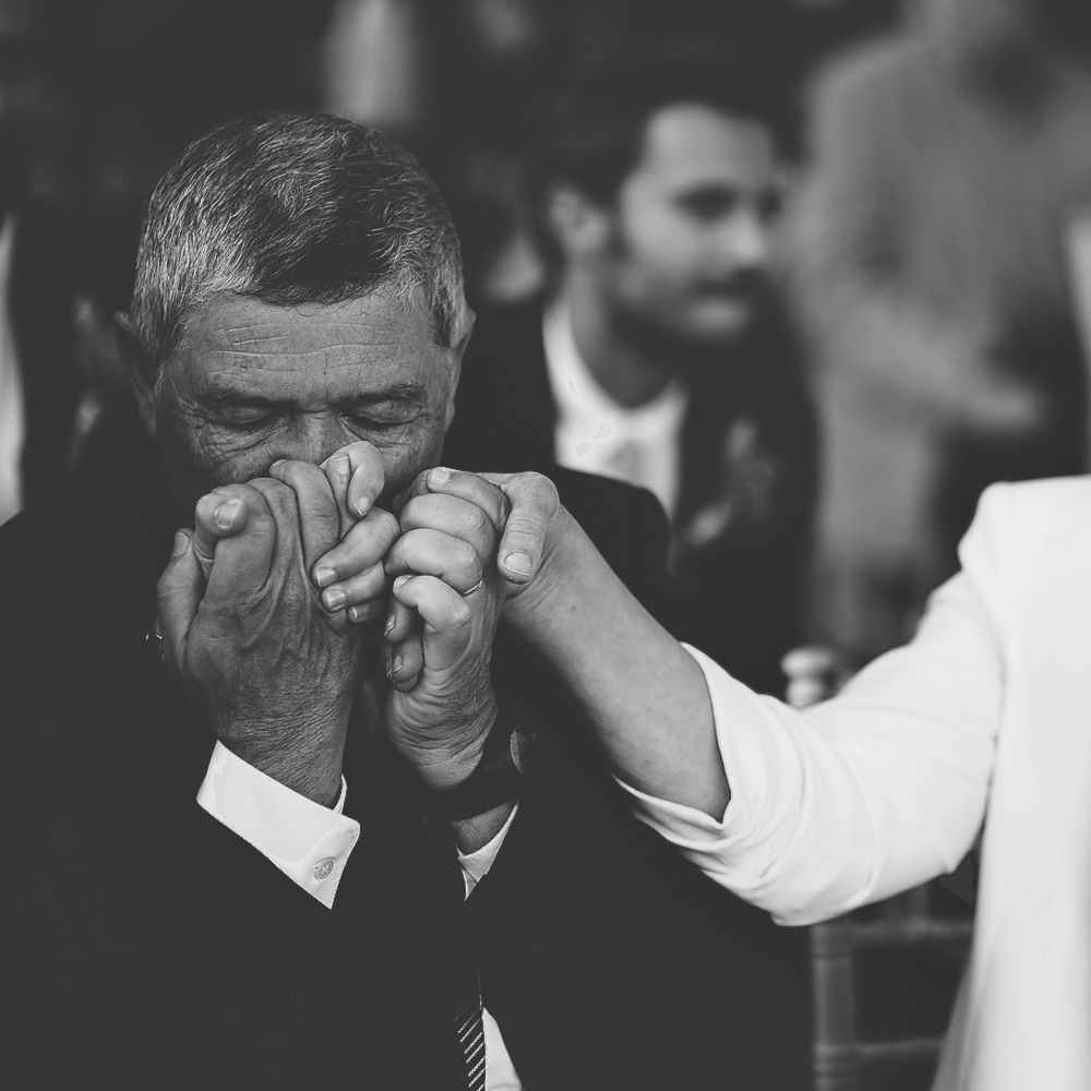 Wedding Guests Kissing his Wife's Hand