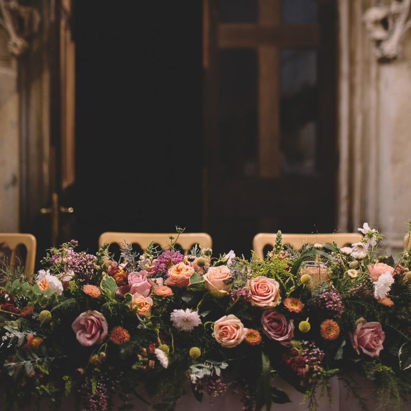 Top Table Wedding Flowers with Pink, Peach and Yellow Roses