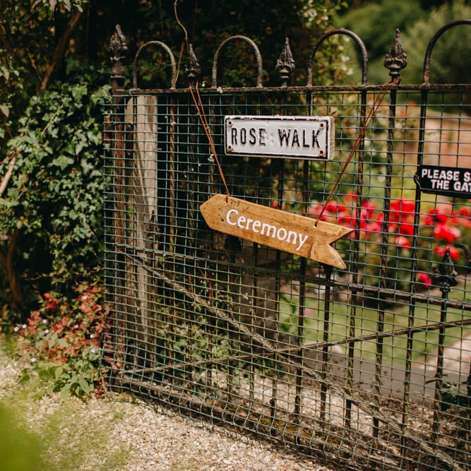 Wooden Arrow Direction Sign | DIY Rustic Tipi Wedding at Riverhill Gardens, Sevenoaks | Frances Sales Photography
