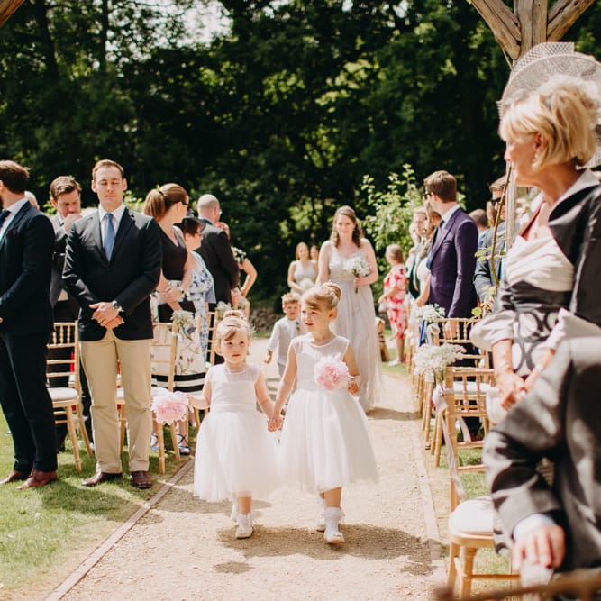 Wedding Ceremony Flower Girl Entrance | DIY Rustic Tipi Wedding at Riverhill Gardens, Sevenoaks | Frances Sales Photography