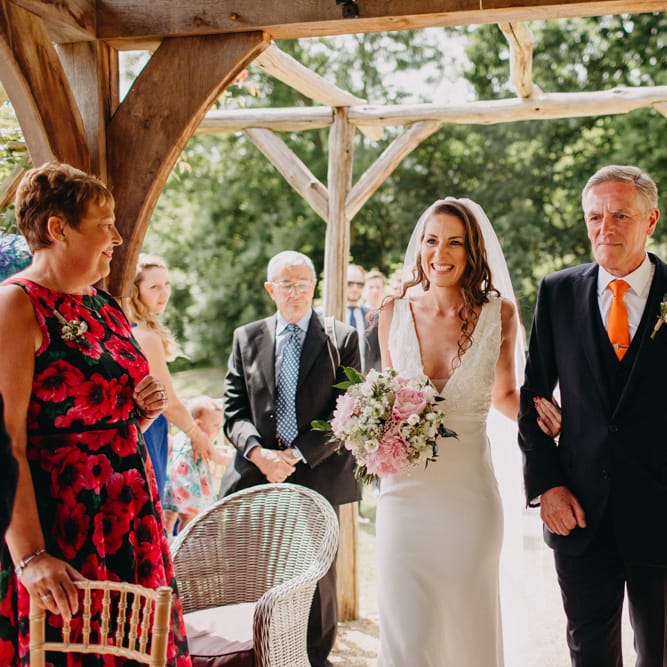 Wedding Ceremony Bridal Entrance in Halo &amp; Wren Wedding Dress | DIY Rustic Tipi Wedding at Riverhill Gardens, Sevenoaks | Frances Sales Photography