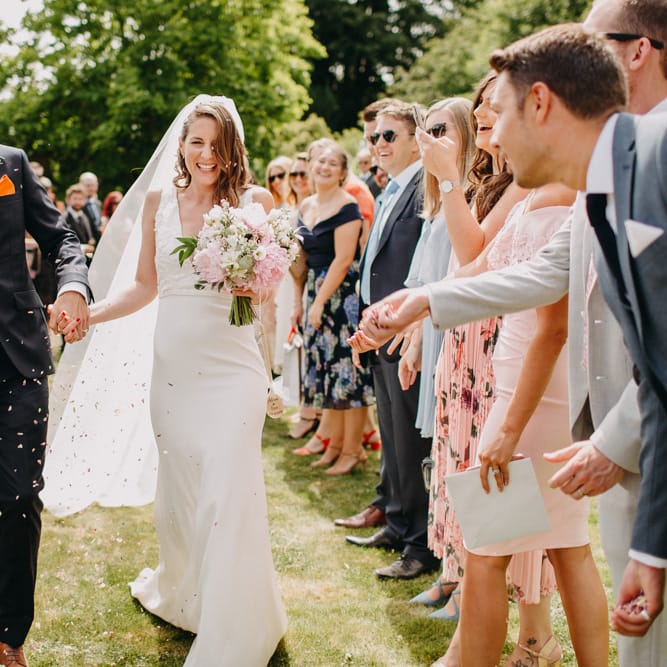 Confetti Moment | Bride in Halo &amp; Wren Wedding Dress | Groom in Moss Bros. Suit | DIY Rustic Tipi Wedding at Riverhill Gardens, Sevenoaks | Frances Sales Photography