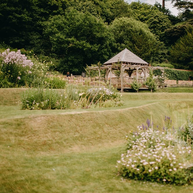 Outdoor Wedding Ceremony Arbour | DIY Rustic Tipi Wedding at Riverhill Gardens, Sevenoaks | Frances Sales Photography