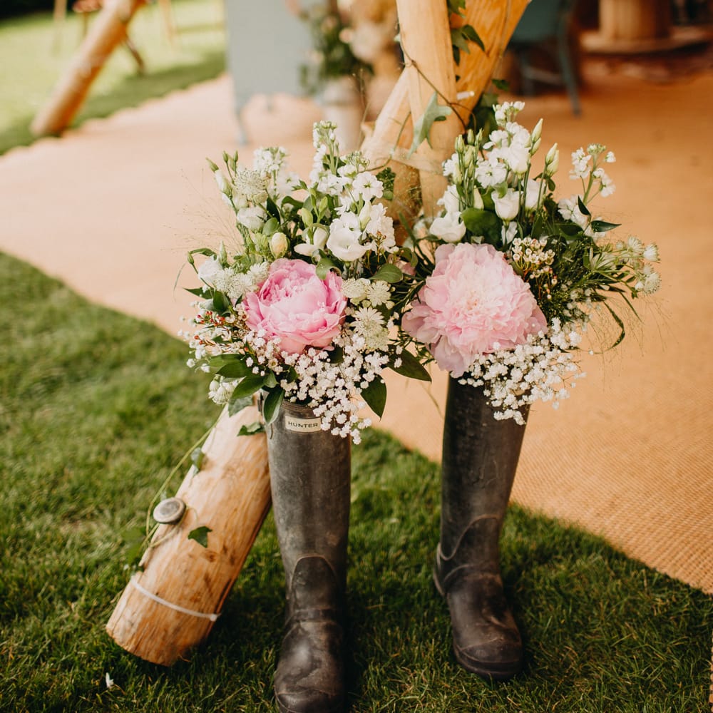 Pink Peony &amp; Gypsophila Flower Filled Wellington Boots Wedding Decor | DIY Rustic Tipi Wedding at Riverhill Gardens, Sevenoaks | Frances Sales Photography