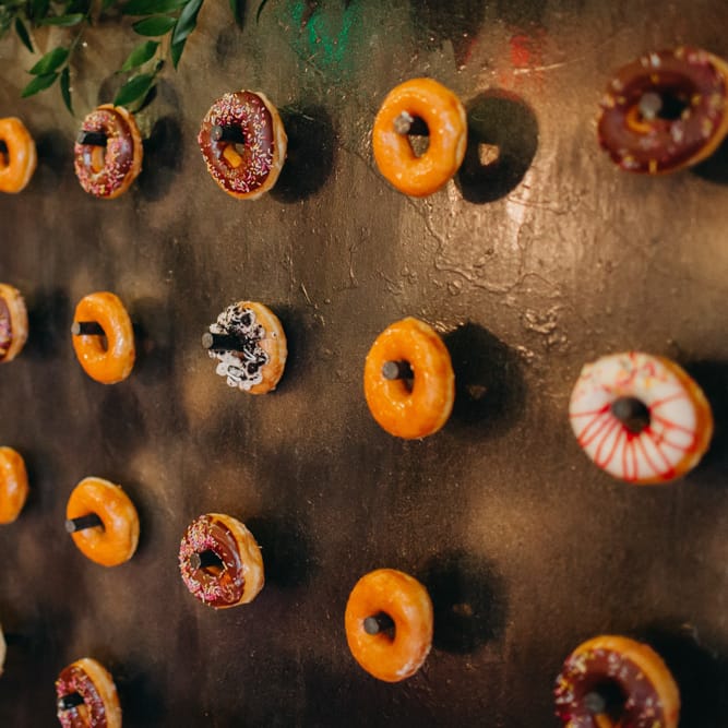 Doughnut Wall | DIY Rustic Tipi Wedding at Riverhill Gardens, Sevenoaks | Frances Sales Photography