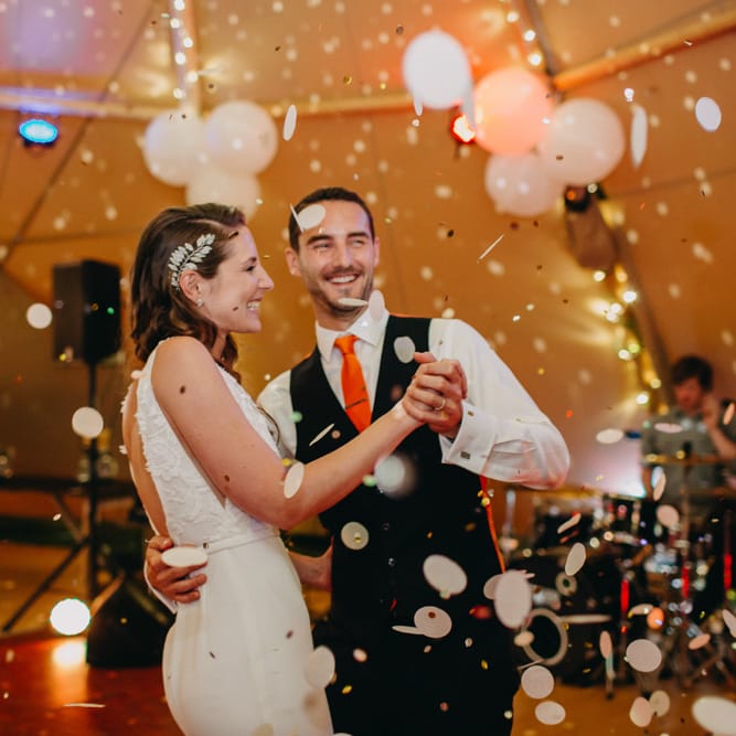 Confetti Bomb First Dance | Bride in Halo &amp; Wren Wedding Dress | Groom in Moss Bros. Suit | DIY Rustic Tipi Wedding at Riverhill Gardens, Sevenoaks | Frances Sales Photography